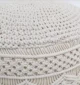 Decorative pouf for living room with stylish design, soft comfort, and versatile functionality.