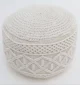 Decorative pouf for living room with stylish design, soft comfort, and versatile functionality.