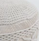 Decorative pouf for living room with stylish design, soft comfort, and versatile functionality.