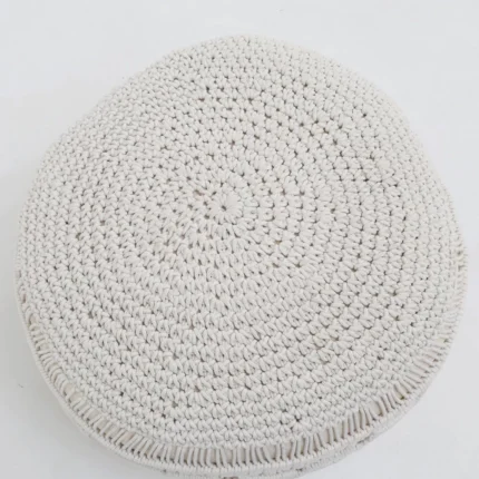 Decorative pouf for living room with stylish design, soft comfort, and versatile functionality.