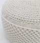 Decorative pouf for living room with stylish design, soft comfort, and versatile functionality.