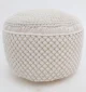 Decorative pouf for living room with stylish design, soft comfort, and versatile functionality.
