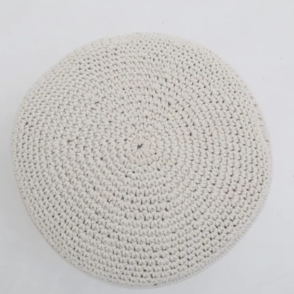 Decorative pouf for living room with stylish design, soft comfort, and versatile functionality.