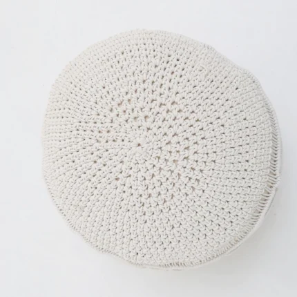 Decorative pouf for living room with stylish design, soft comfort, and versatile functionality.