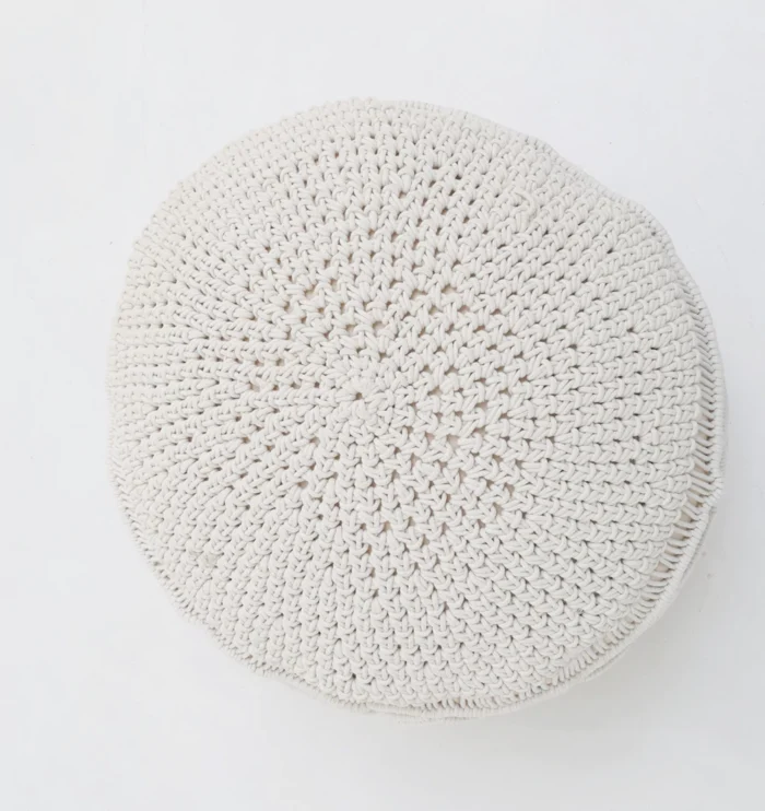 Decorative pouf for living room with stylish design, soft comfort, and versatile functionality.