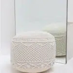 Decorative pouf for living room with stylish design, soft comfort, and versatile functionality.