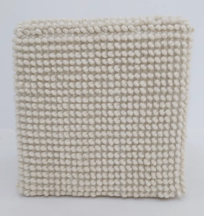 Decorative pouf for living room with stylish design, soft comfort, and versatile functionality.