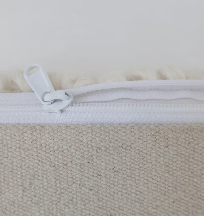 Decorative pouf for living room with stylish design, soft comfort, and versatile functionality.