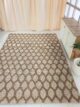 Woven rug with artisanal texture, durable quality, and versatile design for modern and classic interiors.