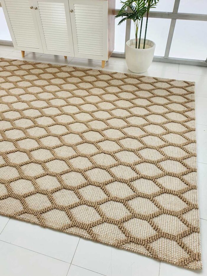 Woven rug with artisanal texture, durable quality, and versatile design for modern and classic interiors.