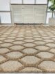 Woven rug with artisanal texture, durable quality, and versatile design for modern and classic interiors.