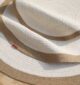 Natural round jute rug with modern circle design, perfect for home UAE décor and stylish living spaces.