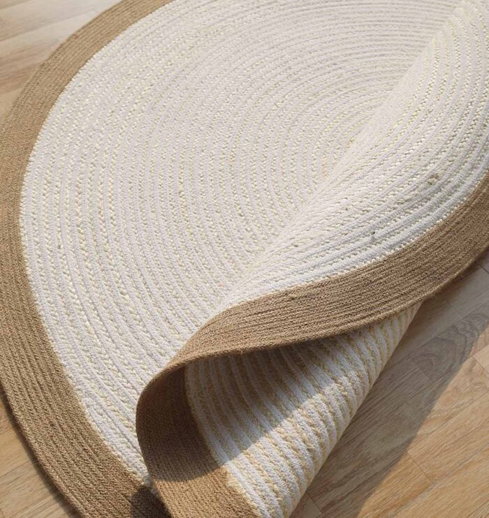 Natural round jute rug with modern circle design, perfect for home UAE décor and stylish living spaces.