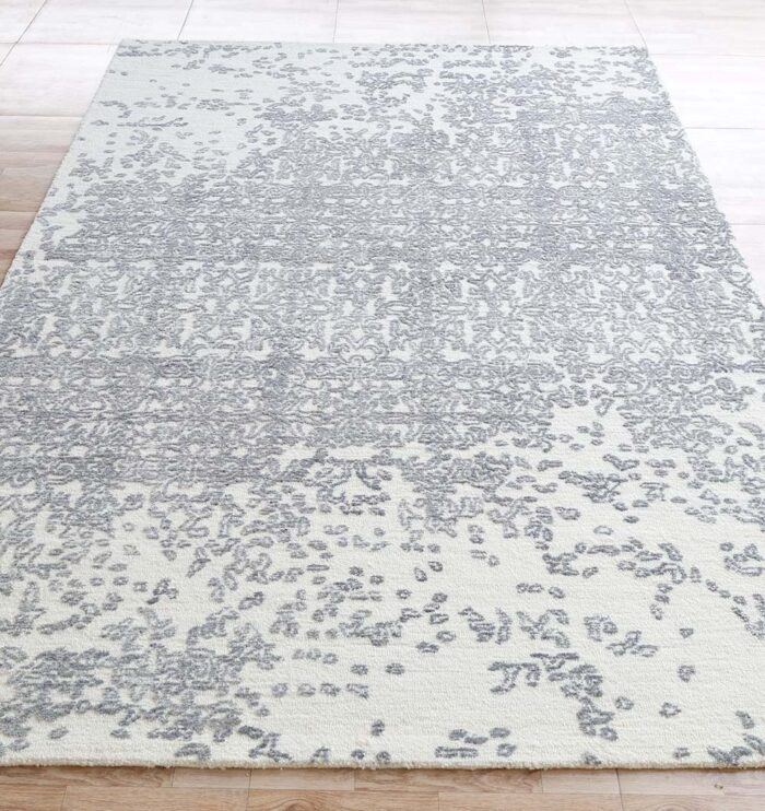 Handmade area rug for home décor, crafted with artisanal detail, soft texture, and timeless style.