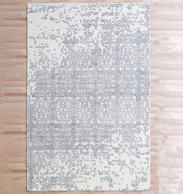 Handmade area rug for home décor, crafted with artisanal detail, soft texture, and timeless style.