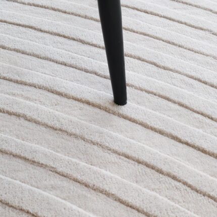 Stylish handmade rugs Dubai, featuring big living room rugs, modern tufted bedroom carpets, and elegant home rugs UAE.
