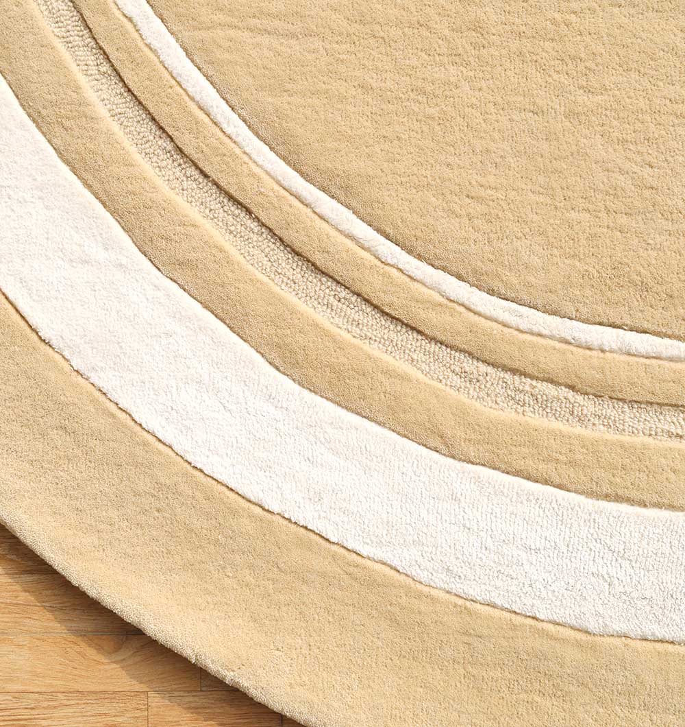 Handmade Rugs Dubai – Buy Tufted Round & Circular Rugs for Home UAE Elegant handmade round tufted rug Dubai, circular carpet for living room and bedroom, premium rugs UAE.