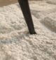 White round shaggy rug with soft plush texture, modern design, and cozy comfort for home décor.