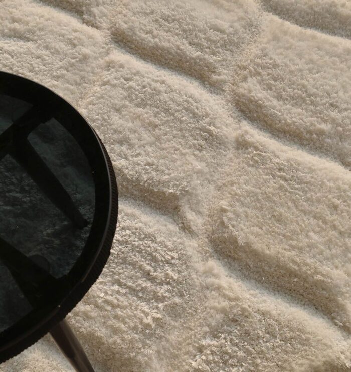 White round shaggy rug with soft plush texture, modern design, and cozy comfort for home décor.