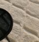 White round shaggy rug with soft plush texture, modern design, and cozy comfort for home décor.