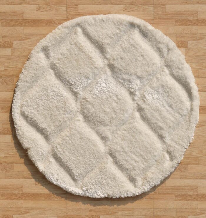 White round shaggy rug with soft plush texture, modern design, and cozy comfort for home décor.