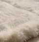 White round shaggy rug with soft plush texture, modern design, and cozy comfort for home décor.