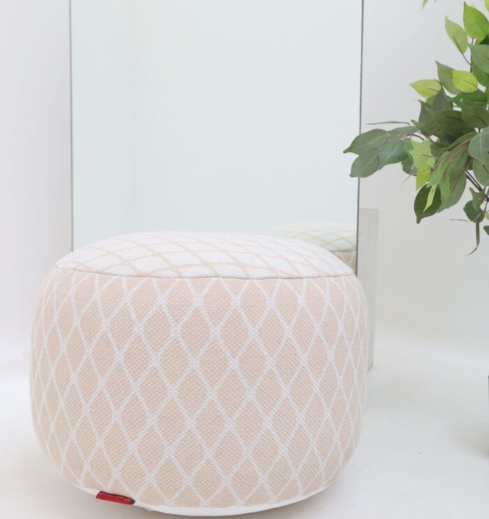 Versatile modern pouf serving as a foot rest, foot stool, and pouf seat for UAE homes.