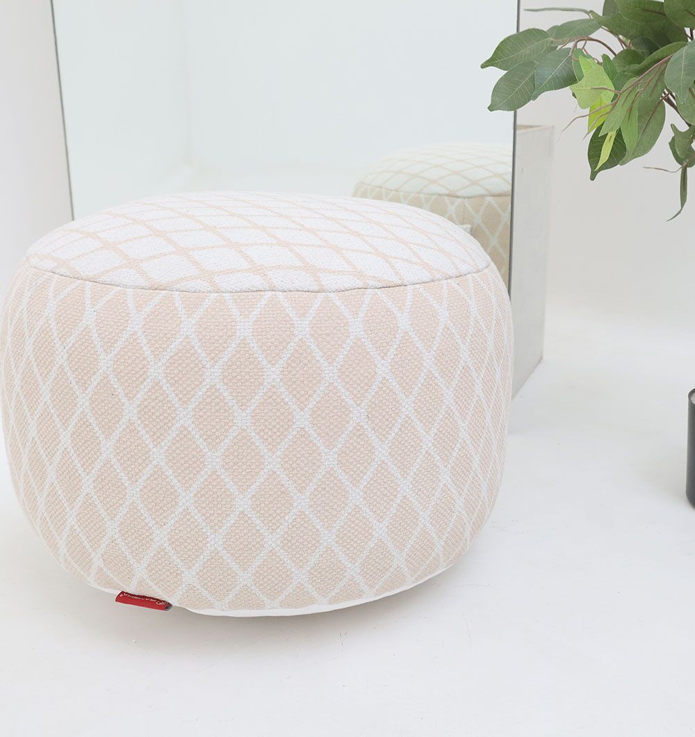 Modern Pouf for Foot Rest and Extra Seating in UAE Versatile modern pouf serving as a foot rest, foot stool, and pouf seat for UAE homes.