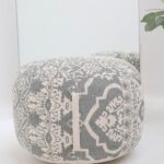 Elegant pouf seat and foot stool for modern homes in UAE, used as a stylish foot rest or extra seating.