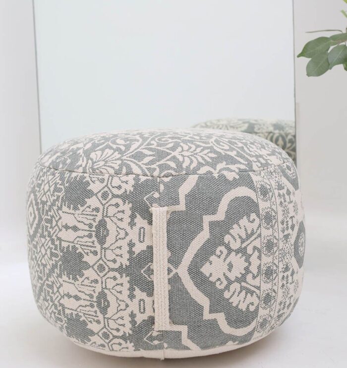 Elegant pouf seat and foot stool for modern homes in UAE, used as a stylish foot rest or extra seating.