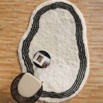 Luxurious plum fur rug with a soft shaggy texture, perfect as a living room carpet or bedroom rug in UAE homes.