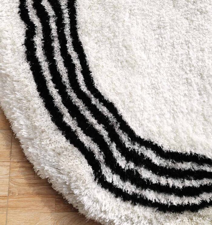 Luxurious plum fur rug with a soft shaggy texture, perfect as a living room carpet or bedroom rug in UAE homes.