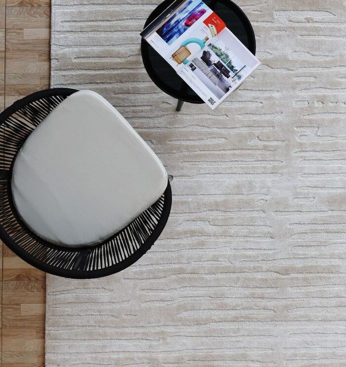 Handmade area rug for home décor, crafted with artisanal detail, soft texture, and timeless style.