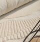 Handmade rug crafted with artisanal skill, offering unique design, warmth, and lasting durability.