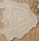 Handmade rug crafted with artisanal skill, offering unique design, warmth, and lasting durability.
