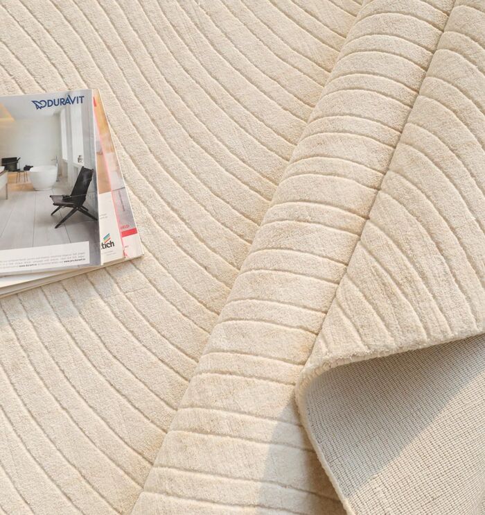 Natural handmade area rug crafted with premium materials, offering timeless style, warmth, and durability.