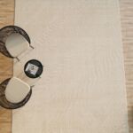 Natural handmade area rug crafted with premium materials, offering timeless style, warmth, and durability.