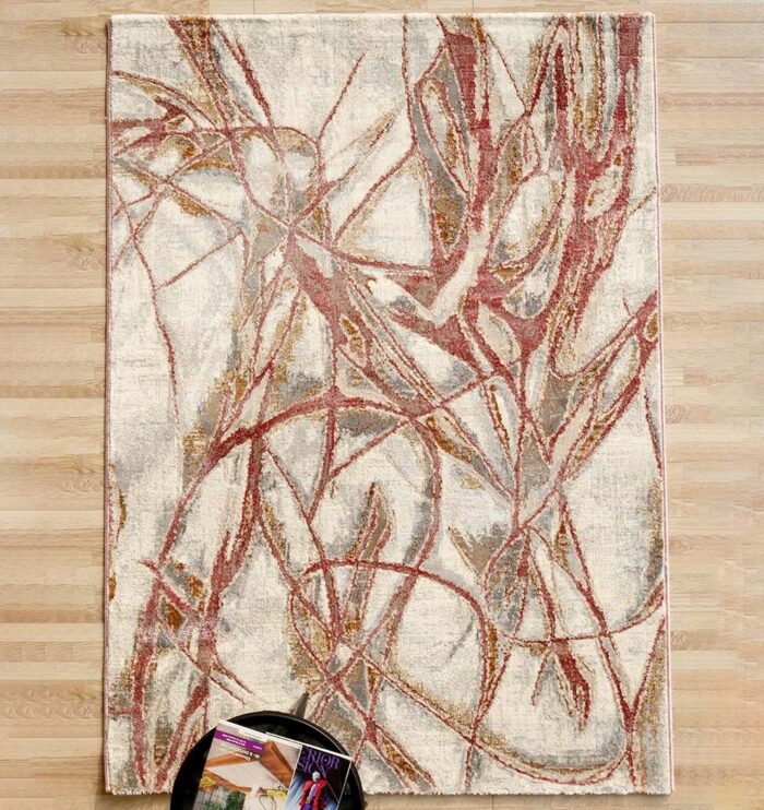 Machine-made rug with modern patterns, soft texture, and long-lasting durability for home décor.
