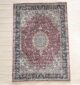 Machine-made rug featuring durable construction, stylish patterns, and easy-care design for modern homes.