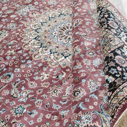 Machine-made rug featuring durable construction, stylish patterns, and easy-care design for modern homes.