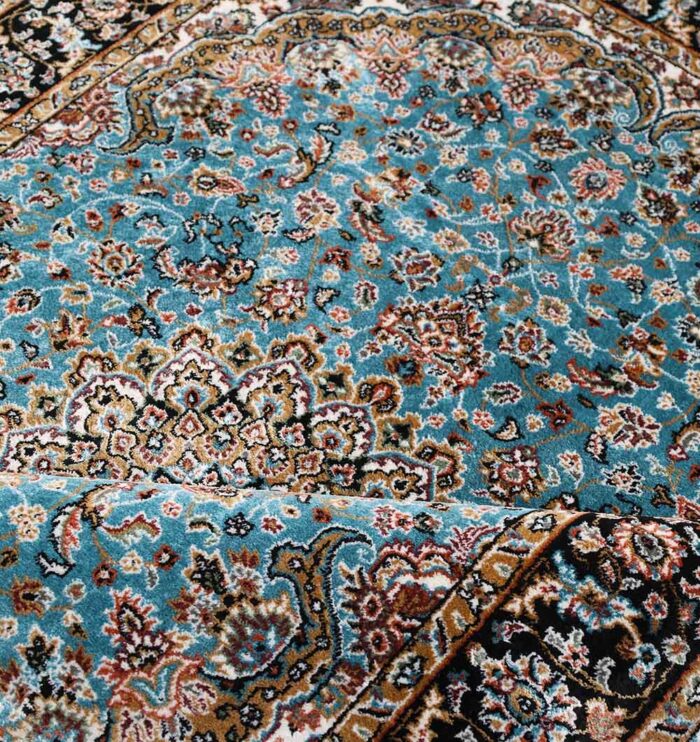 Machine-made rug featuring durable construction, stylish patterns, and easy-care design for modern homes.