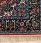 Machine-made rug with modern patterns, soft texture, and long-lasting durability for home décor.