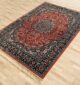 Machine-made rug with modern patterns, soft texture, and long-lasting durability for home décor.