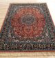 Machine-made rug with modern patterns, soft texture, and long-lasting durability for home décor.