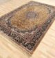 Machine-made rug with modern patterns, soft texture, and long-lasting durability for home décor.