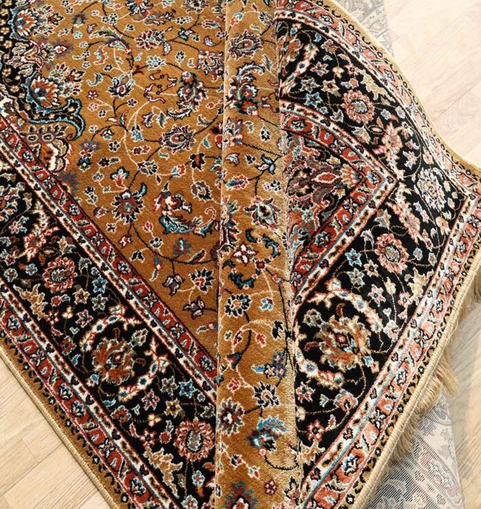 Machine-made rug with modern patterns, soft texture, and long-lasting durability for home décor.