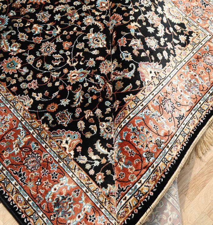Machine-made rug with modern patterns, soft texture, and long-lasting durability for home décor.