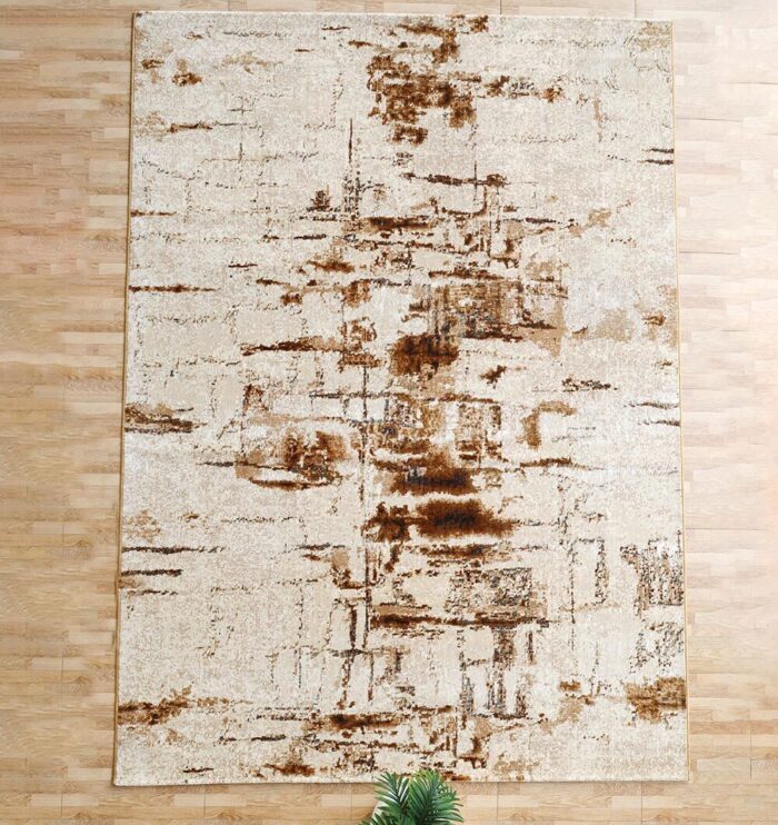 Machine-made rug with modern patterns, soft texture, and long-lasting durability for home décor.