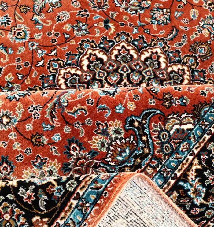 Machine-made rug featuring durable construction, stylish patterns, and easy-care design for modern homes.