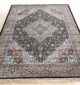 Machine-made rug featuring durable construction, stylish patterns, and easy-care design for modern homes.